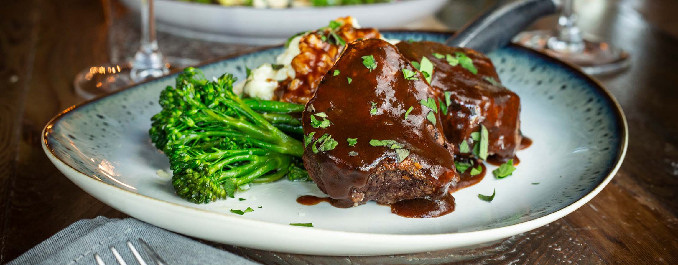 Twin Filets with Demi-glace served at Napa Kitchen and Bar