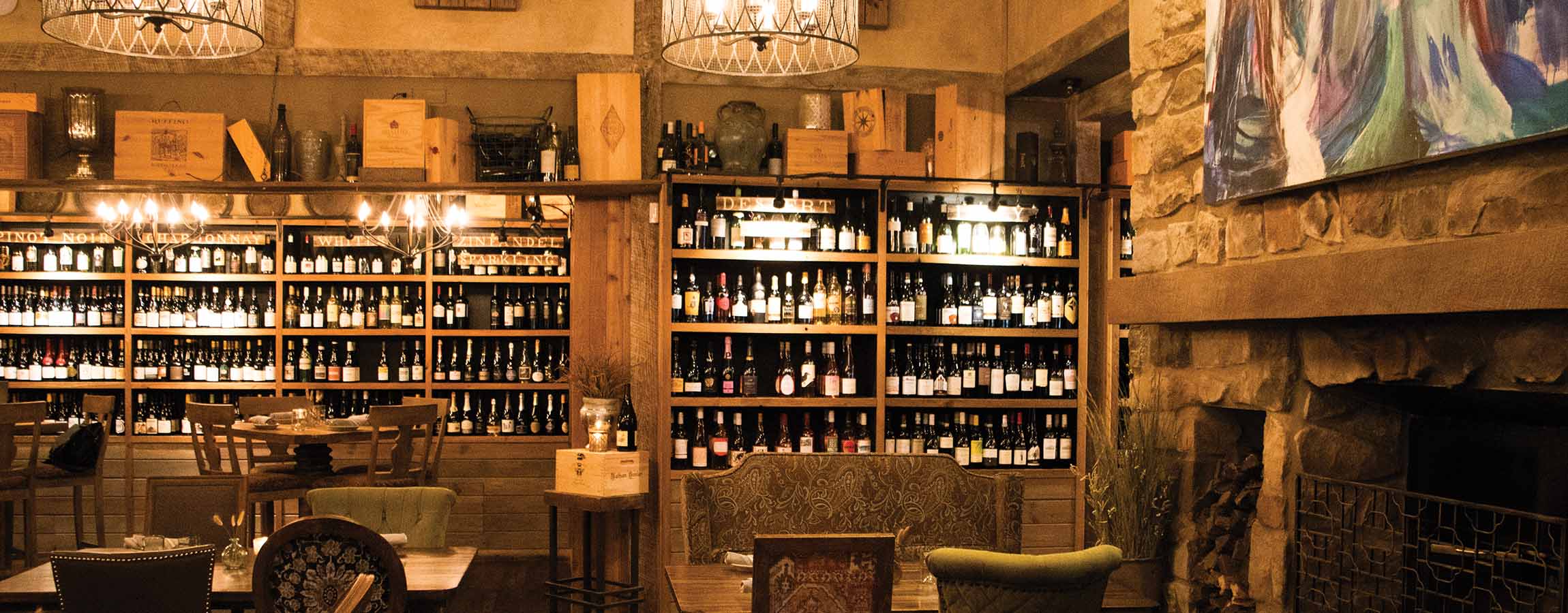 Open wine cellar wall in dining room at Napa Kitchen & Bar in Dublin, Ohio.