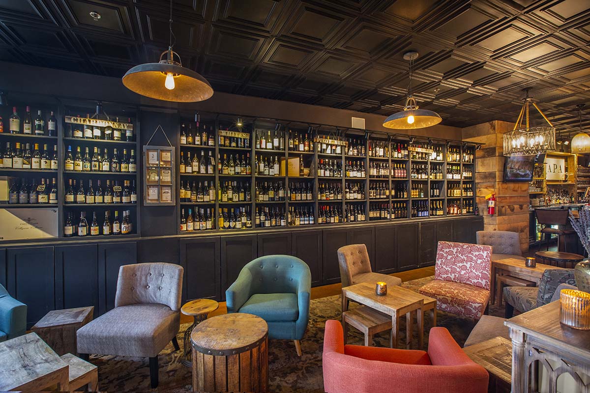 Wall of wines in the open cellar at Napa Kitchen & Bar